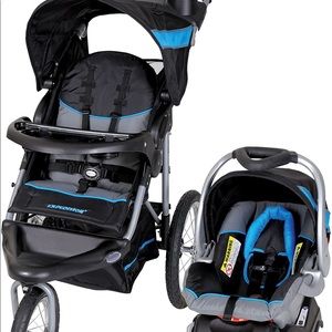 Stroller, car seat, and base. Still in box! NEW